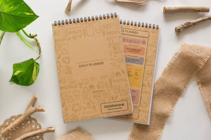 Affordable eco-friendly pocket planner with brown kraft cover and plant